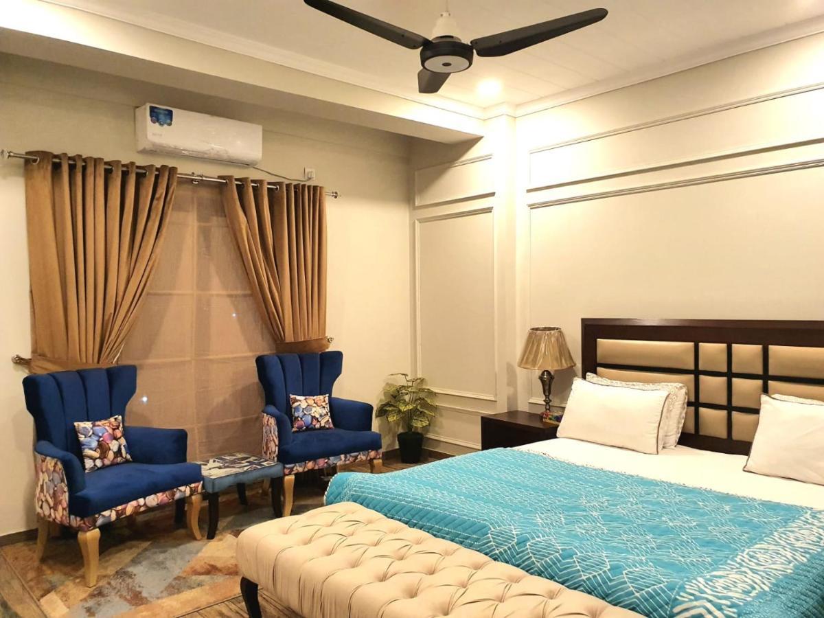 The Millenial Apartments & Suites Bahria Town Rawalpindi Esterno foto
